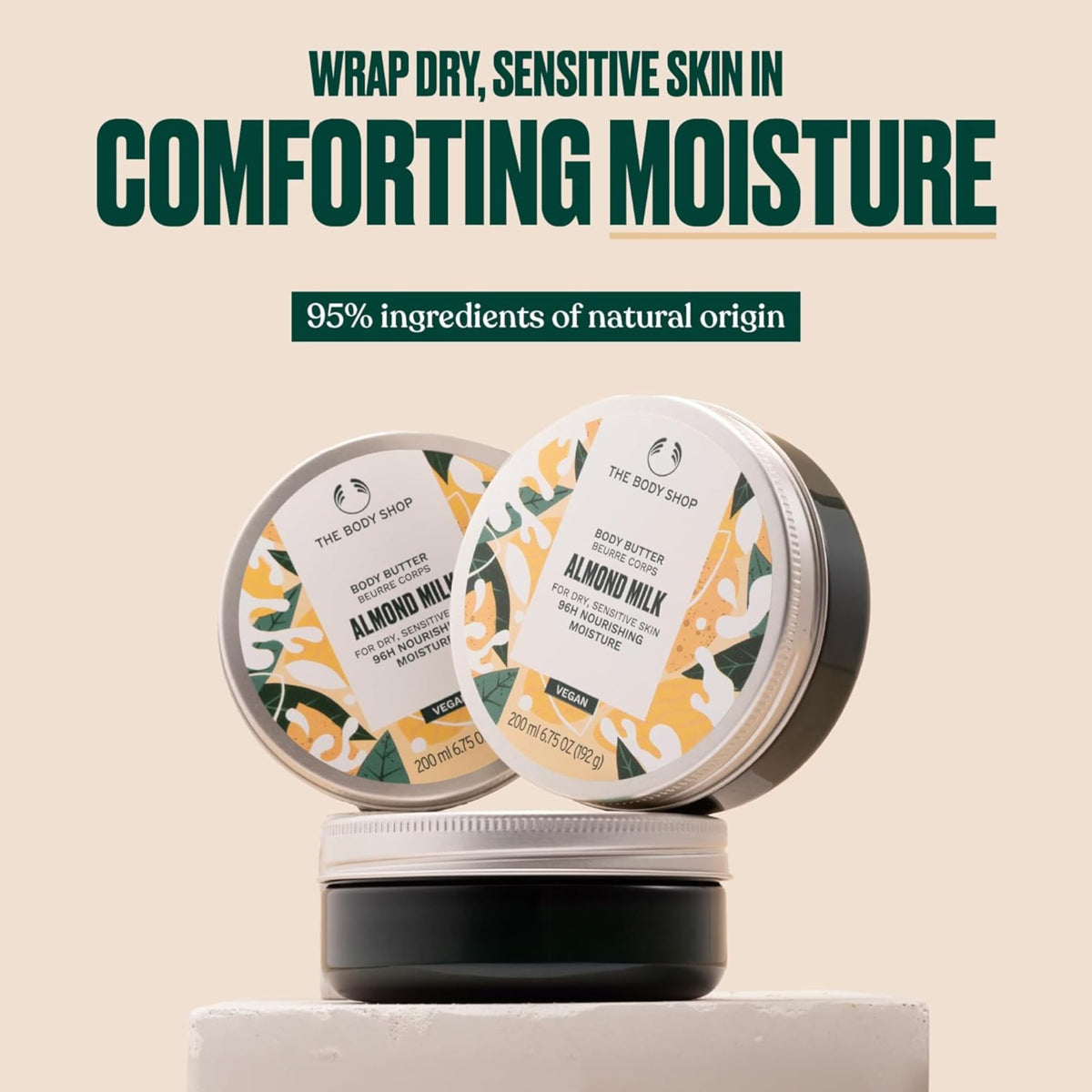 The Body Shop Almond Milk Body Butter texture close-up for hydration.