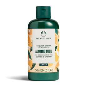 The Body Shop Almond Milk Shower Cream bottle front for gentle hydration of dry skin.