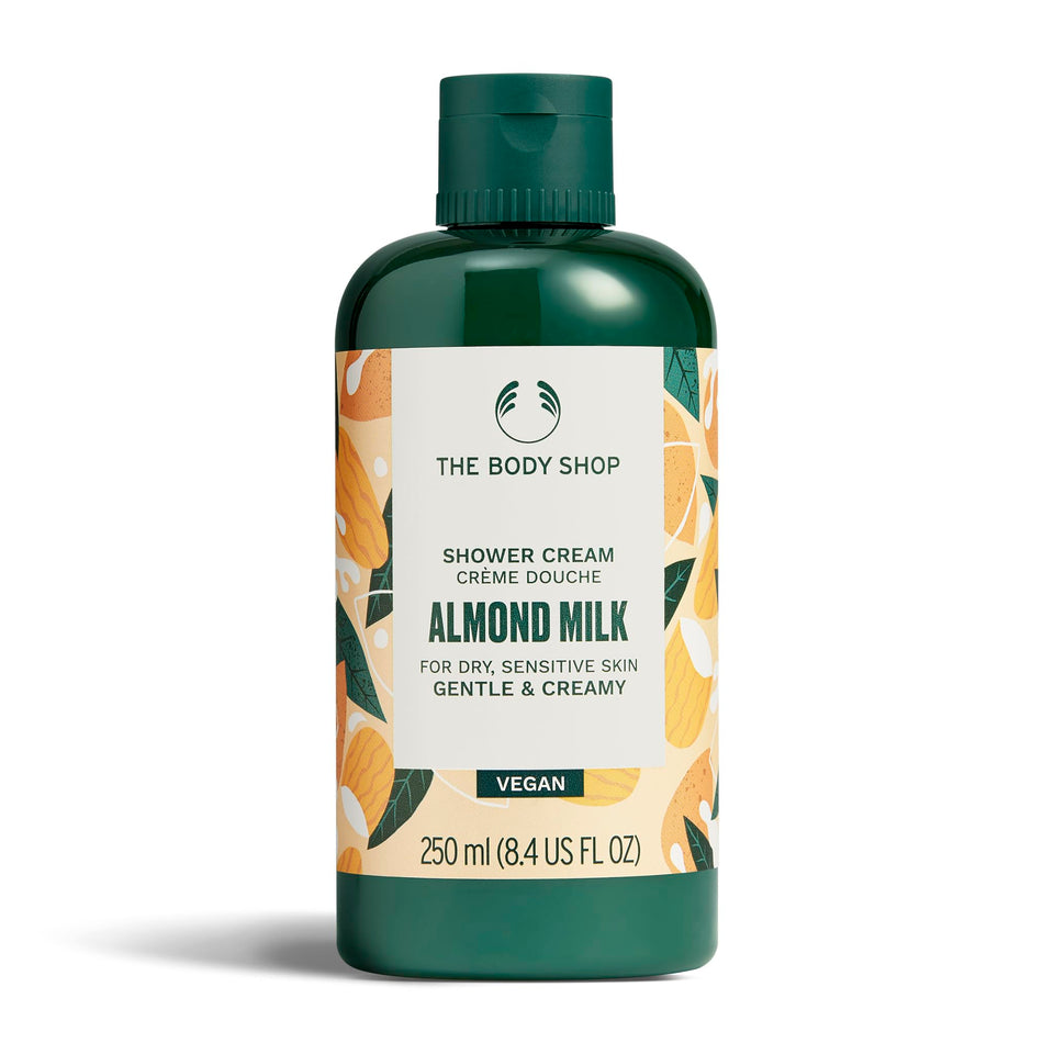 The Body Shop Almond Milk Shower Cream bottle front for gentle hydration of dry skin.