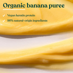 Shower shelf view of conditioner with fruity banana scent enhances daily hair routine