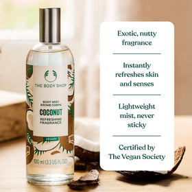 The Body Shop Coconut Body Mist being applied to wrist for quick refresh