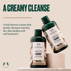 The Body Shop Coconut Shower Cream lather releasing nutty scent during cleansing.