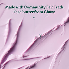The Body Shop Dewberry Body Butter massaged into dry skin on arm