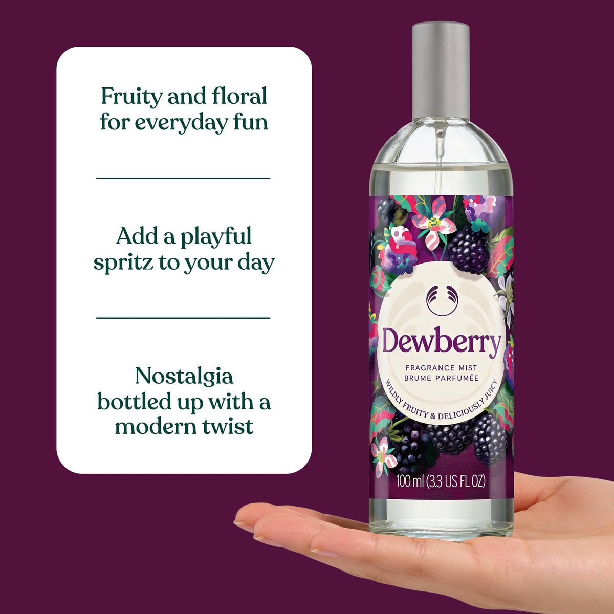 The Body Shop Dewberry Fragrance Mist being applied to clothes for subtle scent layering.