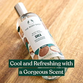The Body Shop Shea Body Mist spritz application delivering a refreshing aroma.