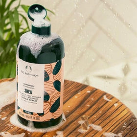 The Body Shop Shea Shower Cream with shea butter in action on skin