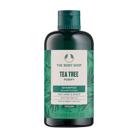 The Body Shop Tea Tree Purifying & Balancing Shampoo bottle promotes fresh cleansing for oily hair.