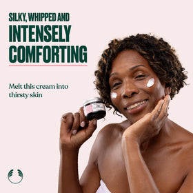 The Body Shop Vitamin E Intense Moisture Cream swirl applied for lasting softness.