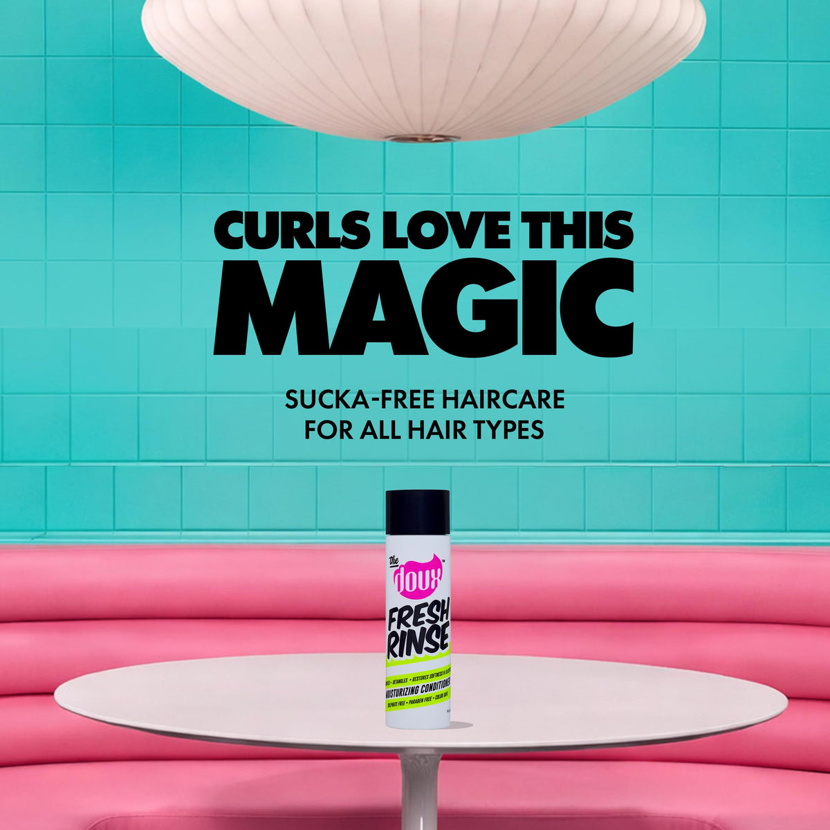 Applying The Doux Fresh Rinse to curly hair enhances detangling and softness