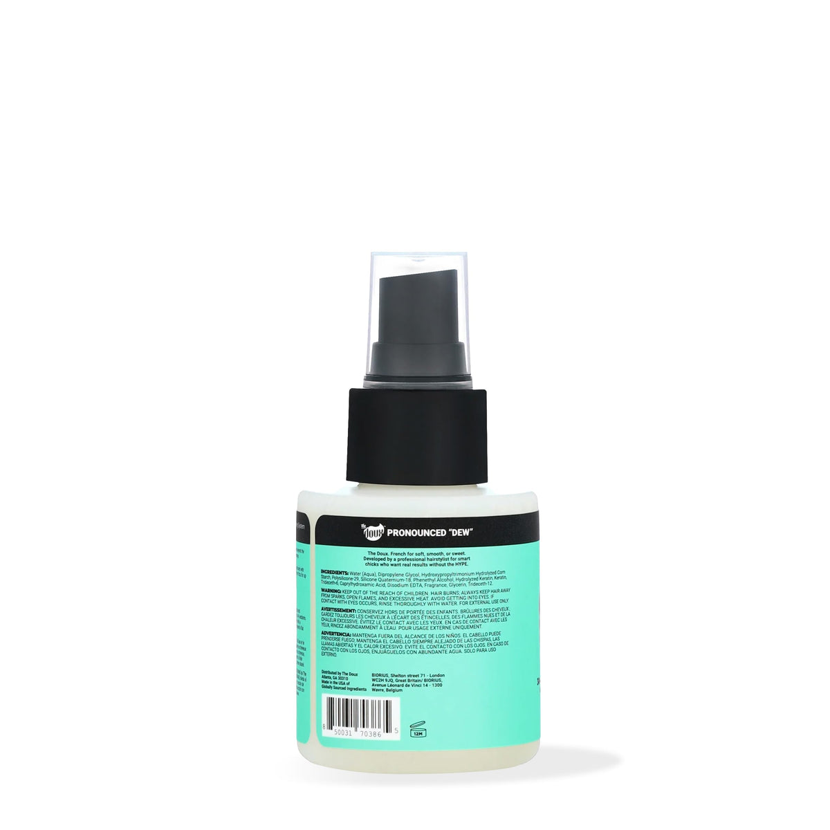 The Doux Silent Treatment spray being applied for sleek, heat-protected curls.