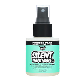 The Doux Silent Treatment bottle close-up showing frizz control possibilities.