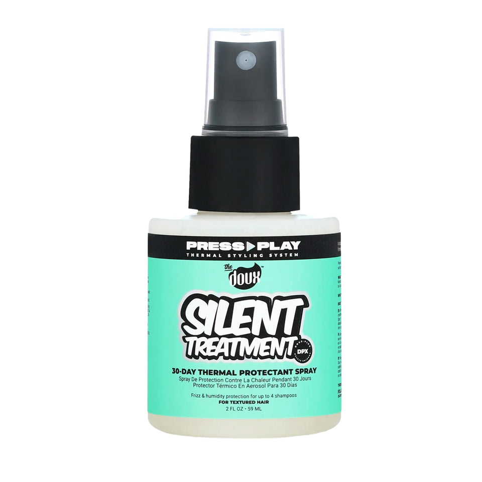 The Doux Silent Treatment bottle close-up showing frizz control possibilities.