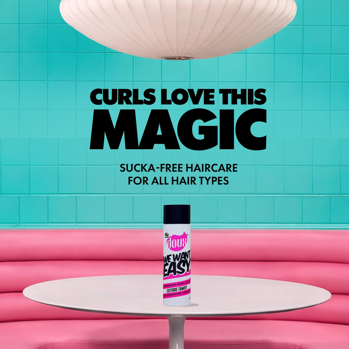 The Doux WE WANT EASY Texture Tamer applied to damp curls for detangling