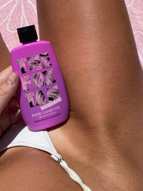 Close-up of macadamia, jojoba, almond oil blend in The Fox Tan Rapid Candy Oil.