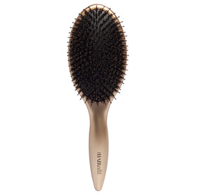 The Hair Edit Finish & Shine brush with seamless design for easy styling.