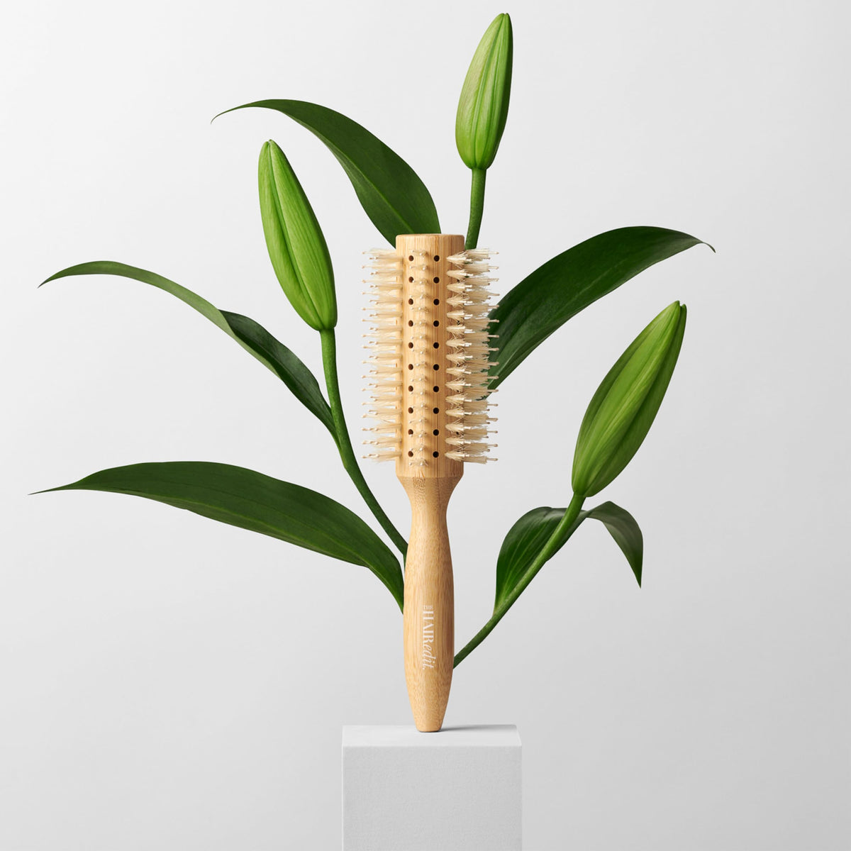 The Hair Edit Sleek Goddess bamboo handle highlights eco friendly materials and design.