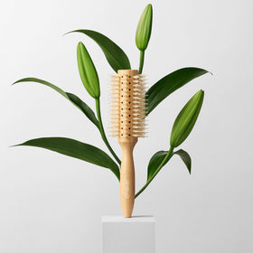 The Hair Edit Sleek Goddess bamboo handle highlights eco friendly materials and design.