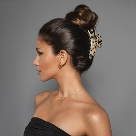 The Hair Edit Vogue tortoise claw clip close-up shows tortoise print and easy grip.