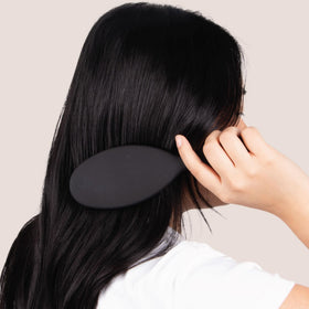 The Hair Shop 909 ergonomic detangler brush for comfortable styling on dry or wet hair