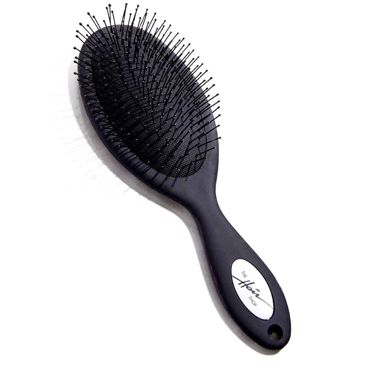 The Hair Shop detangling brush safe for extensions glides through knots with minimal pulling
