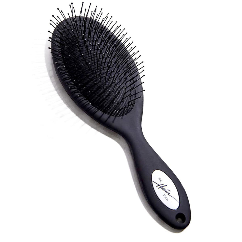The Hair Shop detangling brush safe for extensions glides through knots with minimal pulling