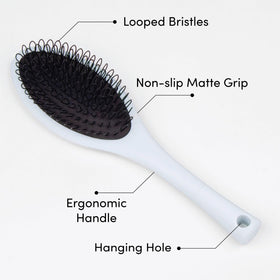 The Hair Shop Light Blue Loop Brush suits wigs and extensions for safe brushing sessions.
