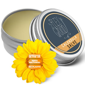 The Ilex Wood Calendula Salve jar close-up for skin soothing and lavender scent.