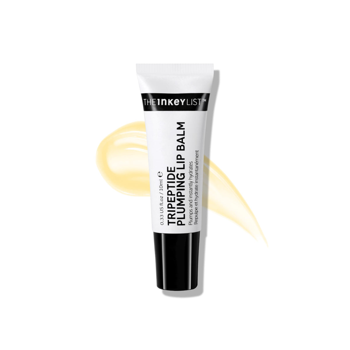 The INKEY List Tripeptide Plumping Lip Balm applied to hydrate and plump lips.