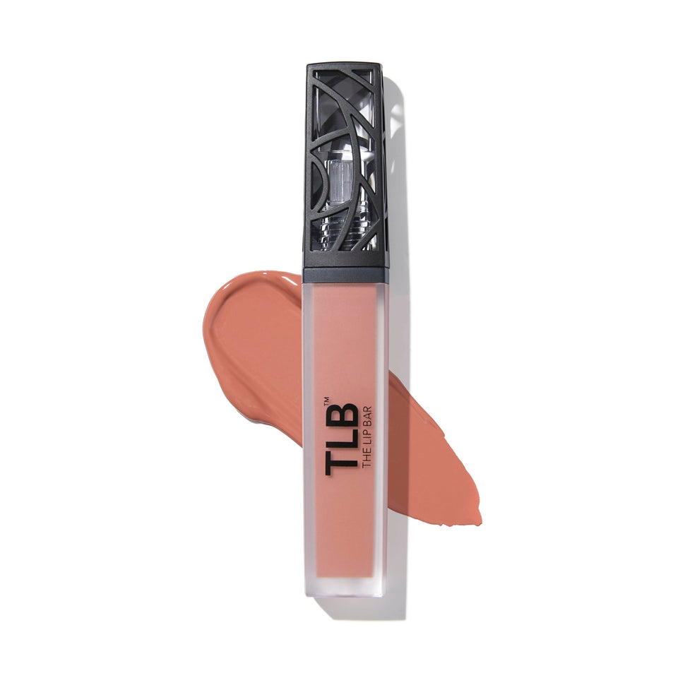 The Lip Bar Commando peachy nude swatch showing all day wear potential