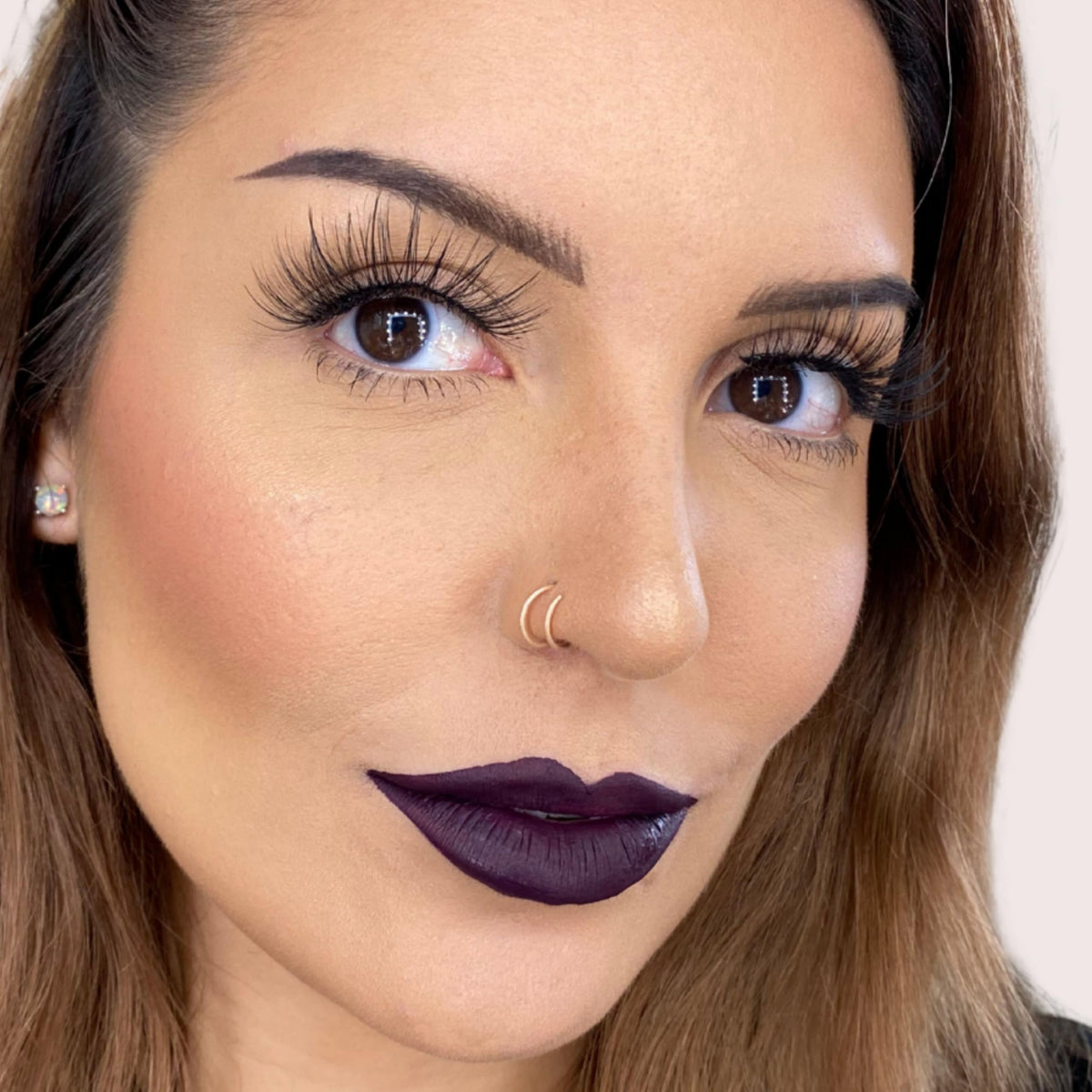 The Lip Bar Drama Queen liquid matte texture delivers smooth glide and quick-dry feel.