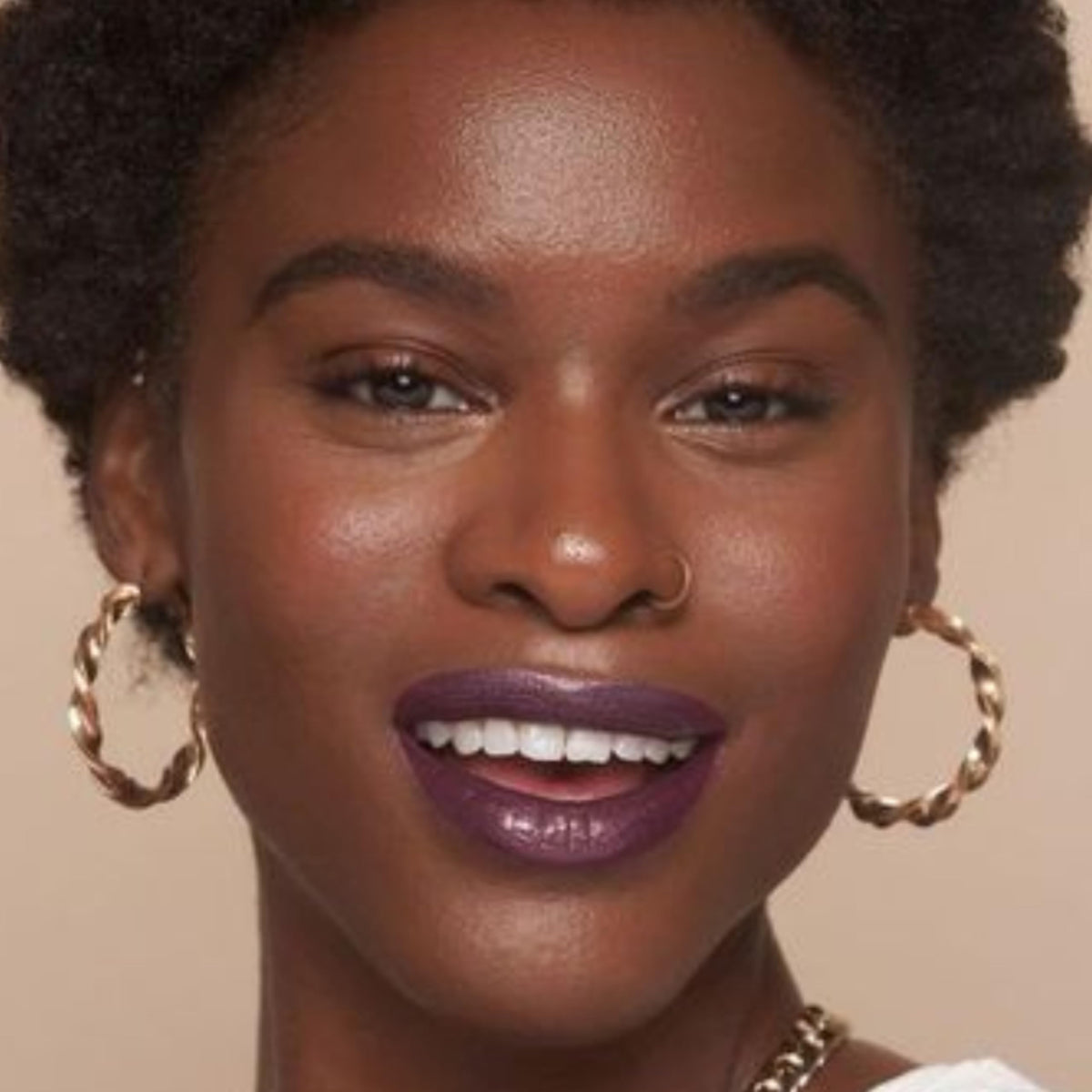 The Lip Bar Drama Queen Deep Eggplant displays a wall-ready shade for confident looks.