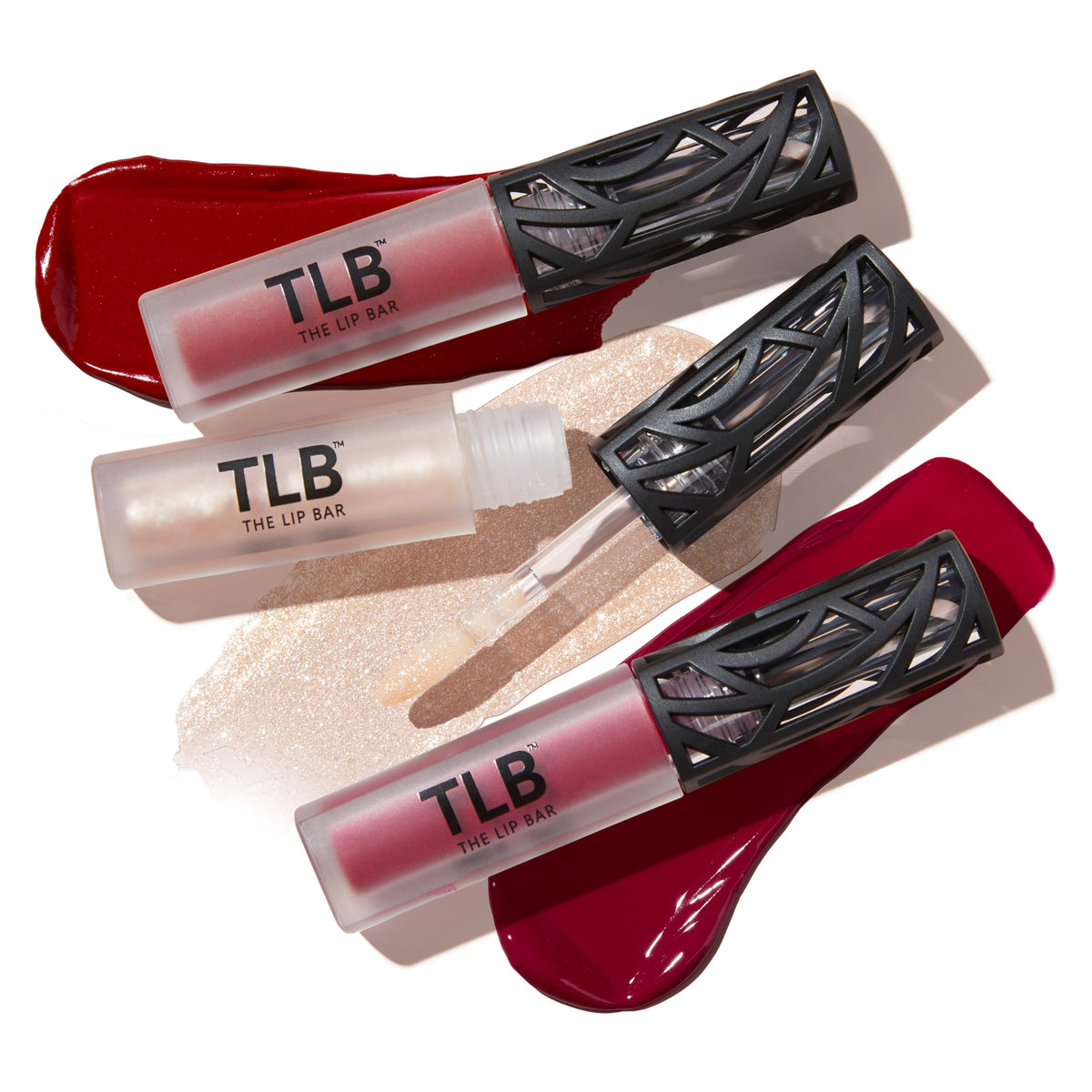 The Lip Bar Gamechanger Gloss Up in sheer nude delivers juicy shine, no stickiness.