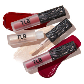 The Lip Bar Gamechanger Gloss Up in sheer nude delivers juicy shine, no stickiness.