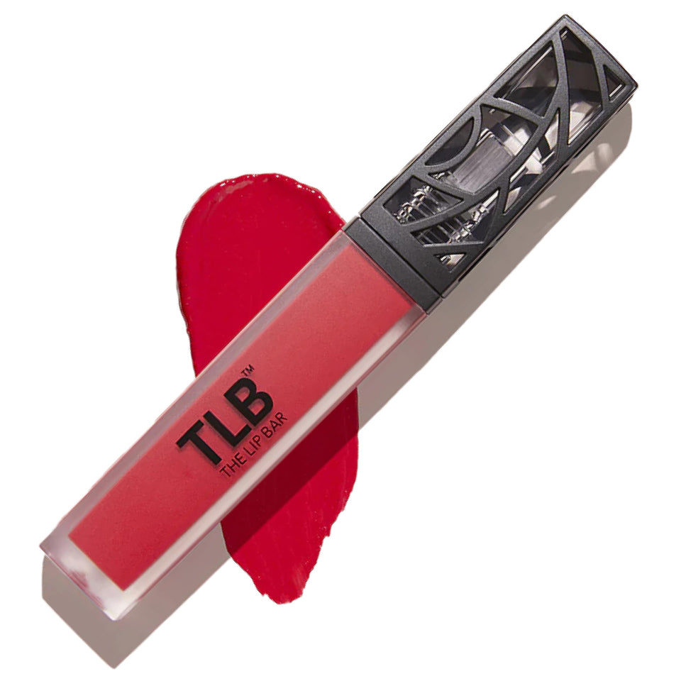 The Lip Bar HauteMess bright pink-red liquid matte swatch for vibrant, long-lasting color.