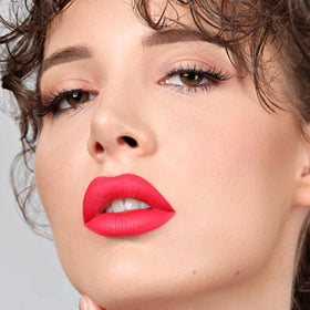 The Lip Bar HauteMess layering with gloss for high-shine contrast.