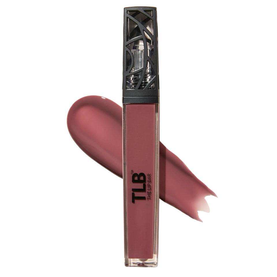 The Lip Bar Upscale Warm Mauve lip gloss on the tube front shows vibrant color for everyday wear