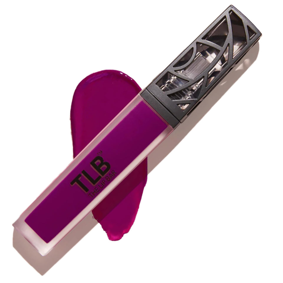The Lip Bar Prima Donna liquid matte in application shows bold color payoff and smooth glide.