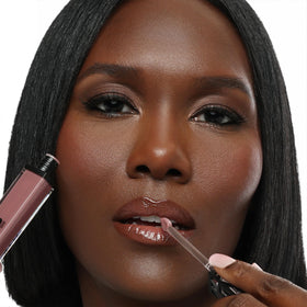 Swatch on lips reveals dusty mauve with natural sheen for a fresh look.