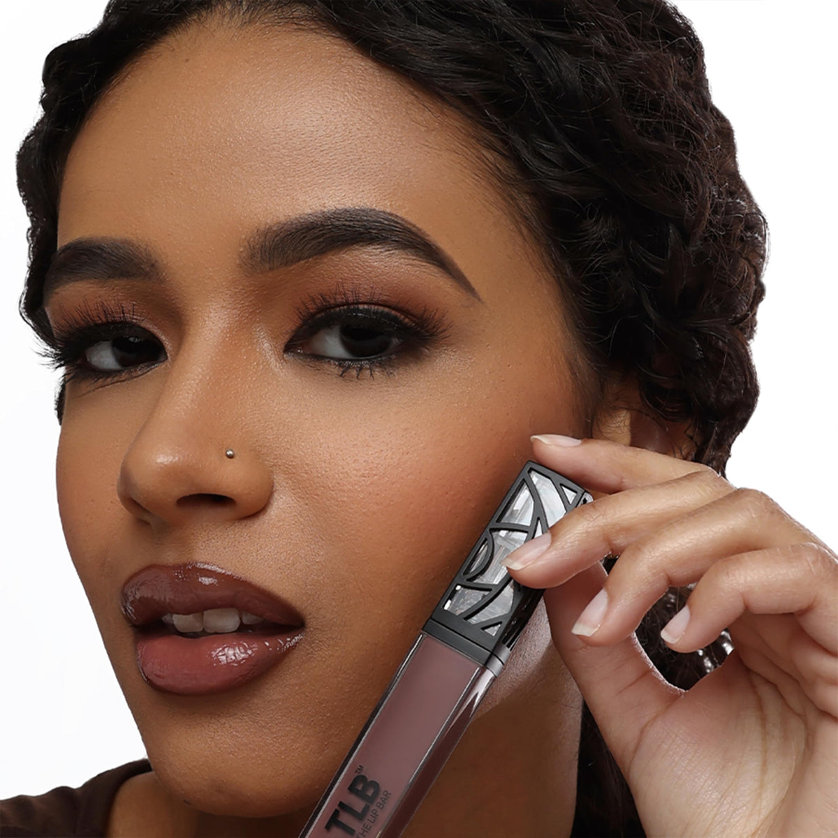Packaging box and branding reflect vegan and cruelty-free lip color.