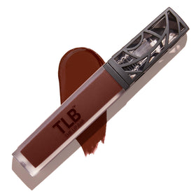 The Lip Bar Savage liquid matte lipstick application with bold color.
