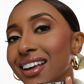 The Lip Bar Well-Read swatches show a sheer dusty nude pink with high shine
