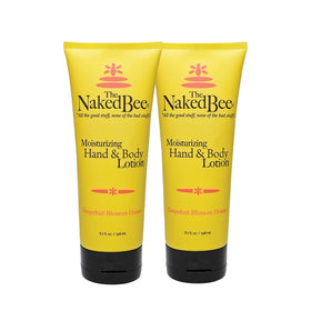 The Naked Bee Grapefruit Blossom Honey hand lotion bottle shown for smooth skin.