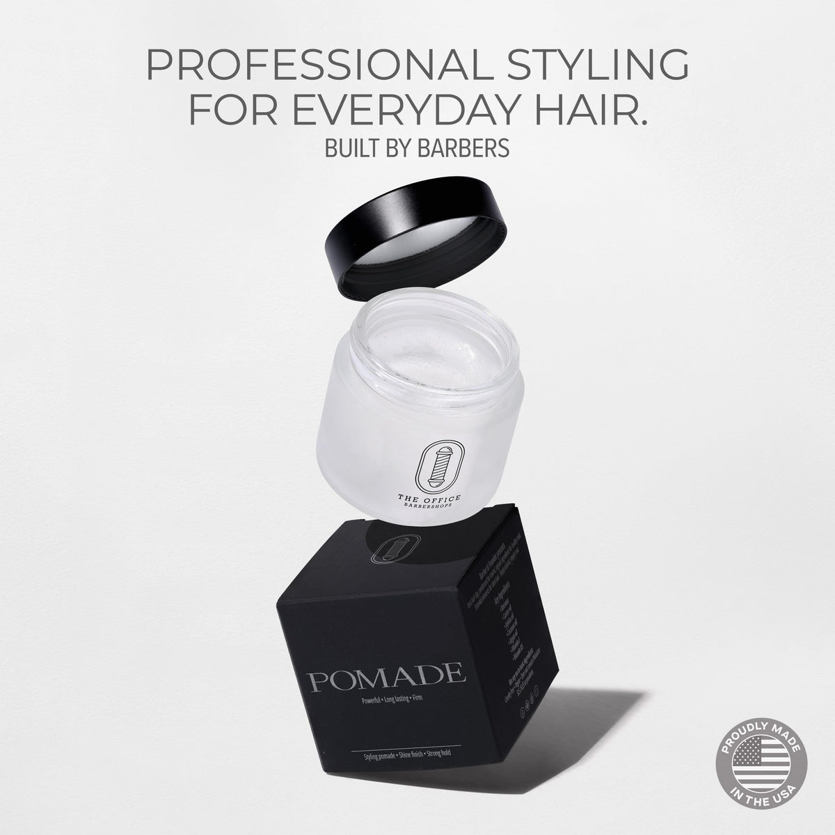 THE OFFICE BARBERSHOPS pomade with classic shine on hands for polished looks