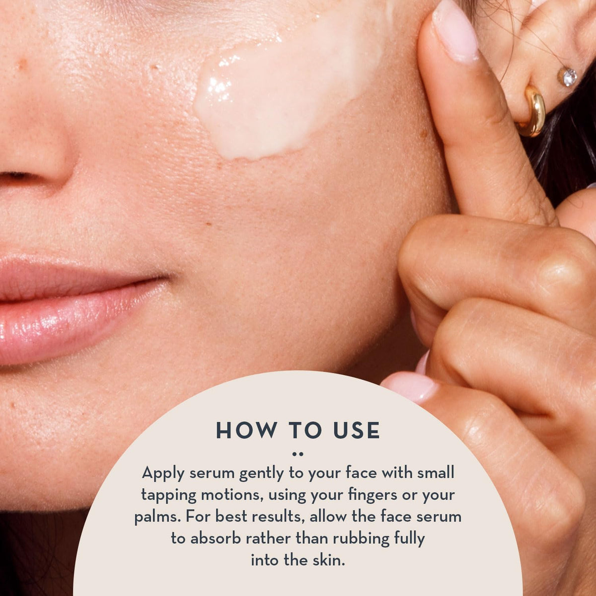 Close-up of creamy texture showing The Organic Skin Co serum hydration.