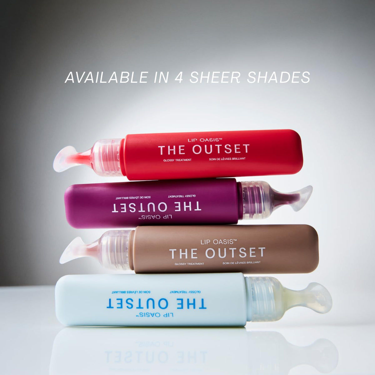 The Outset Lip Oasis 0.3 oz tube highlighting travel-friendly size.