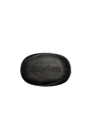 The Roots Naturelle Dudu Osun Black Soap 6-Pack label closeup, highlights natural ingredients