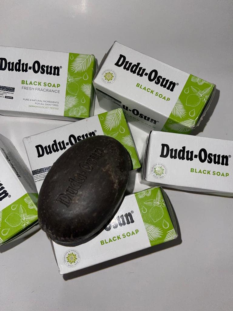 The Roots Naturelle Dudu Osun Black Soap 6-Pack packaging closeup, showcasing eco-friendly design