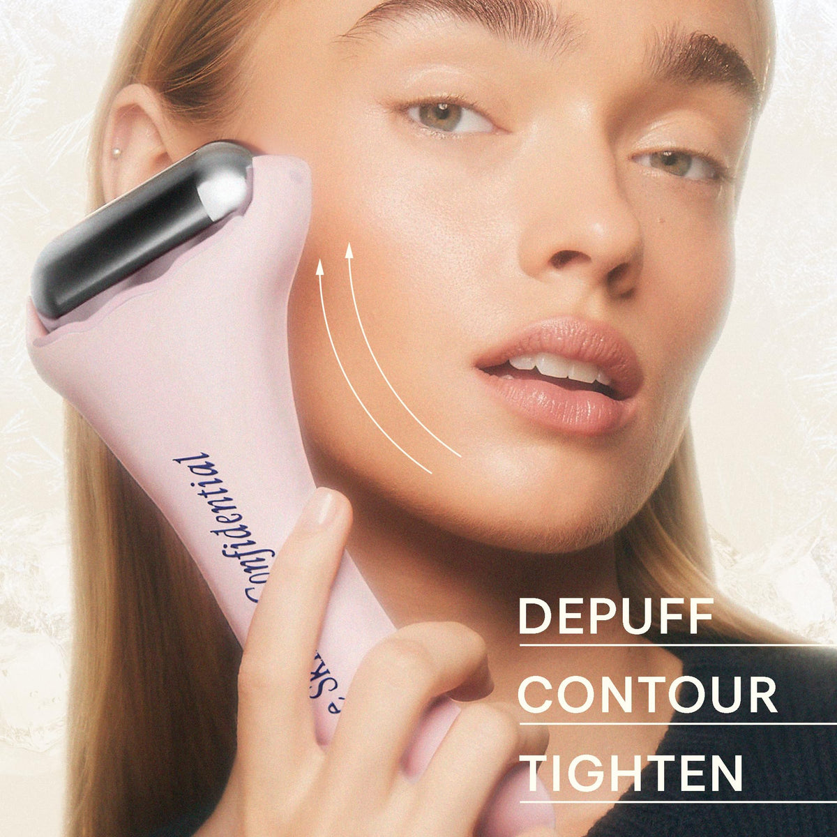 Using the ice roller on the jawline helps depuff and soothe tension.