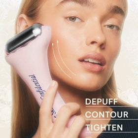 Using the ice roller on the jawline helps depuff and soothe tension.