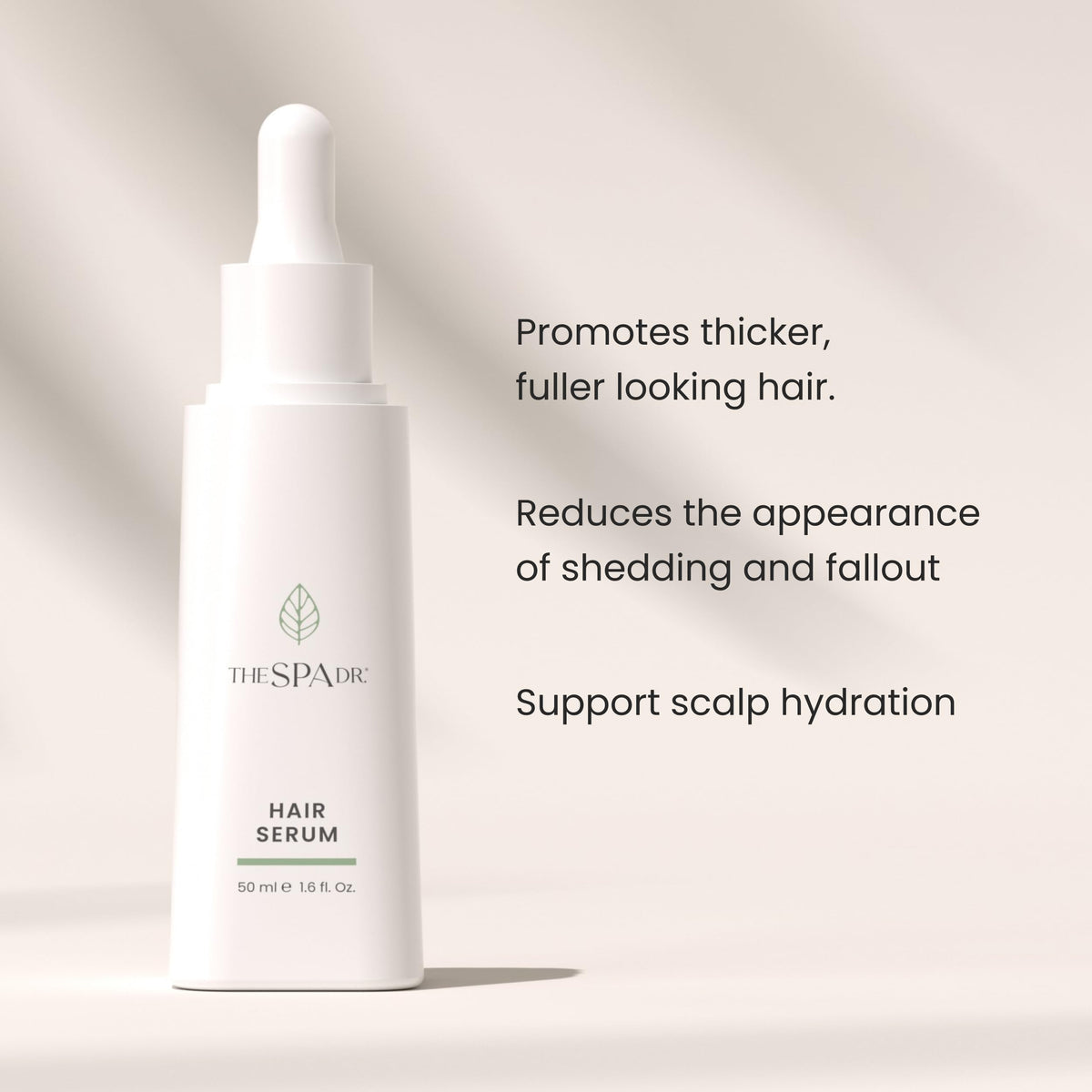The Spa Dr. Hair Serum bottle close-up highlighting clean ingredients and premium formula.